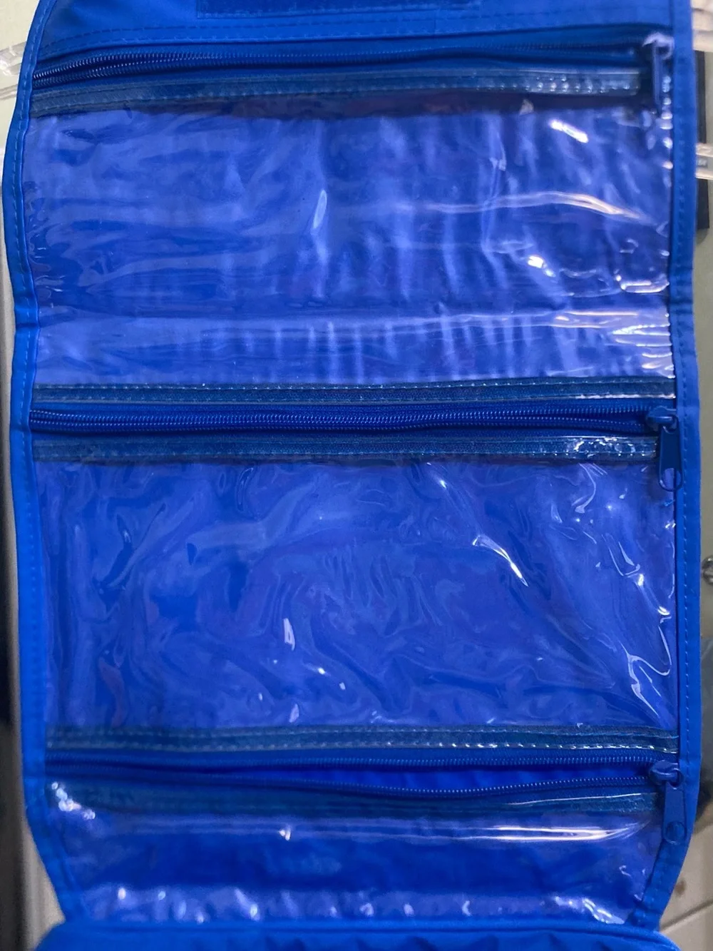 Girl Scouts Blue hanging toiletry & Cosmetic Pouch with Logo. R sections